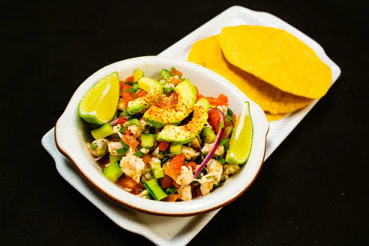 Seafood bowl with cucumber and tostadas