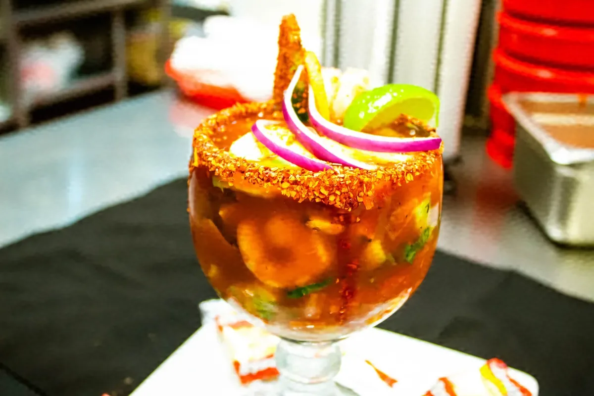 Chili-rimmed cocktail glass with onion